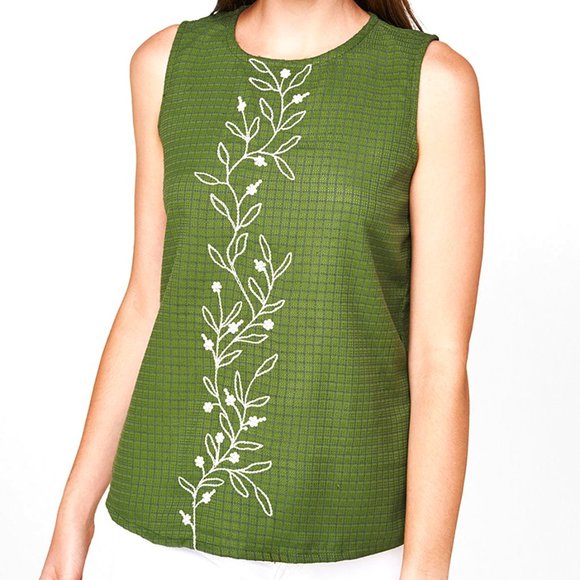 AND sleeveless green casual top with white embroidery on front
